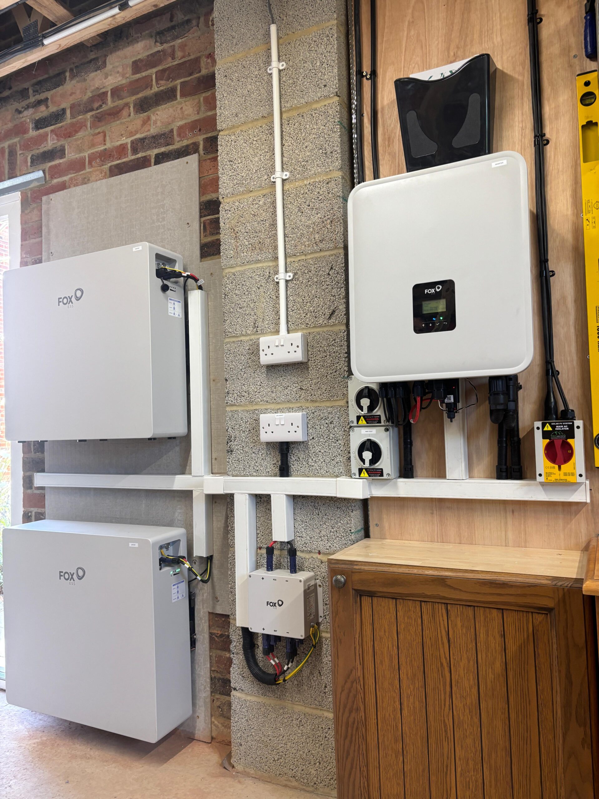 Fox ESS hybrid inverter and EP batteries installed on an outside wall in Durham by Alps Electrical
